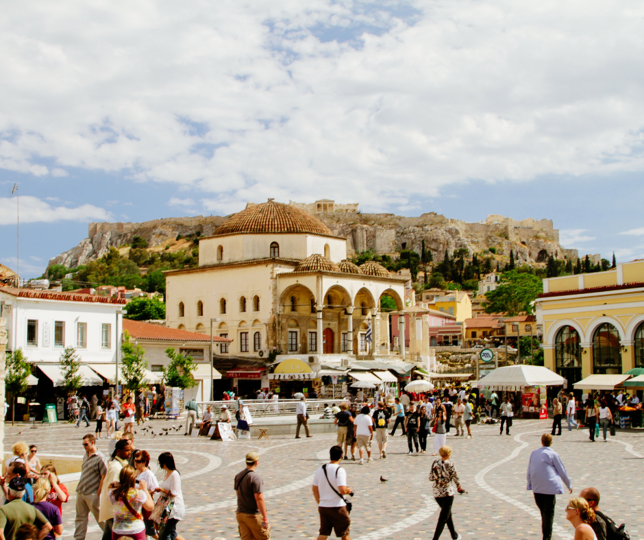 a group of people in a plaza